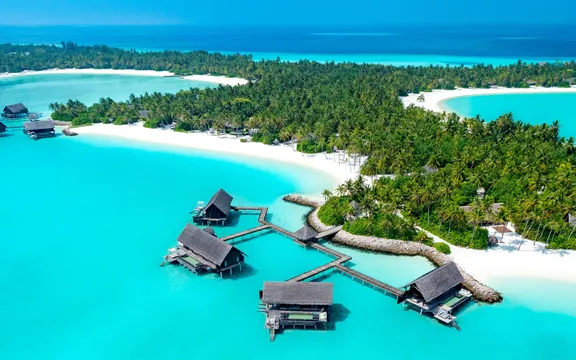Aerial of water villas with pools